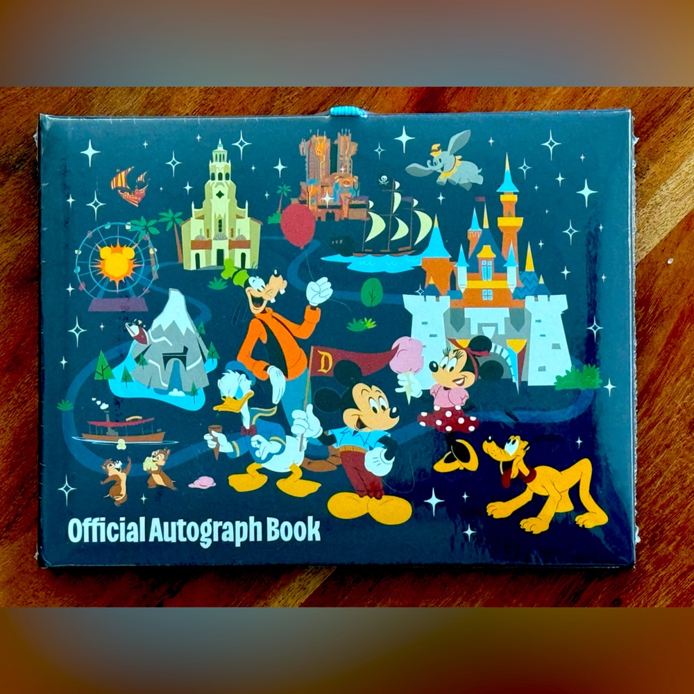 New sealed official from park- Disney Autograph Book